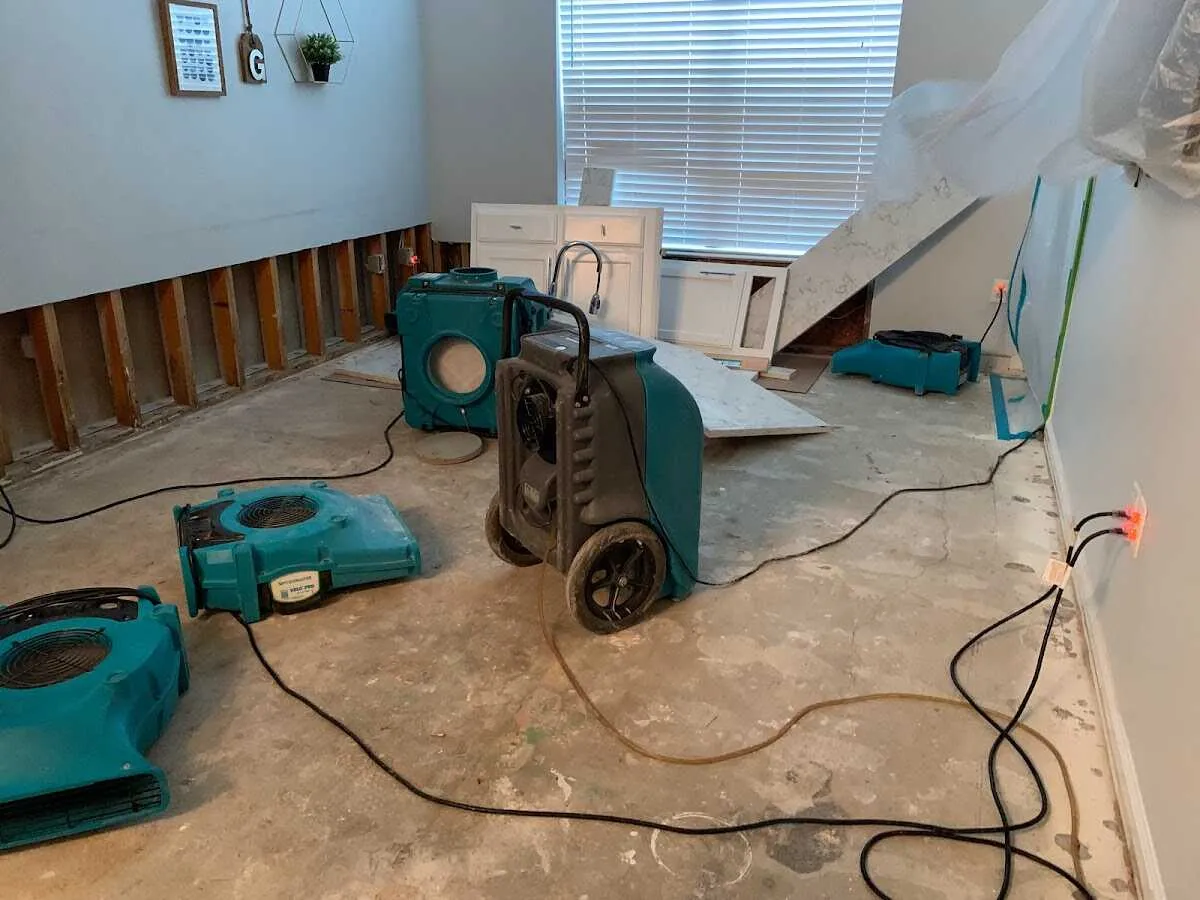 Dehumidifier in flood-cut room for Water Damage Restoration in Bayville