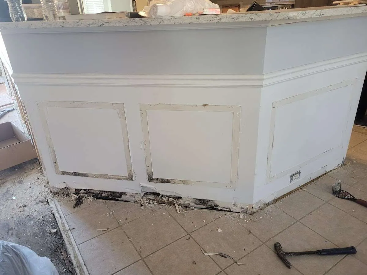 Water damage and mold on kitchen during Storm Damage Restoration in Bayville